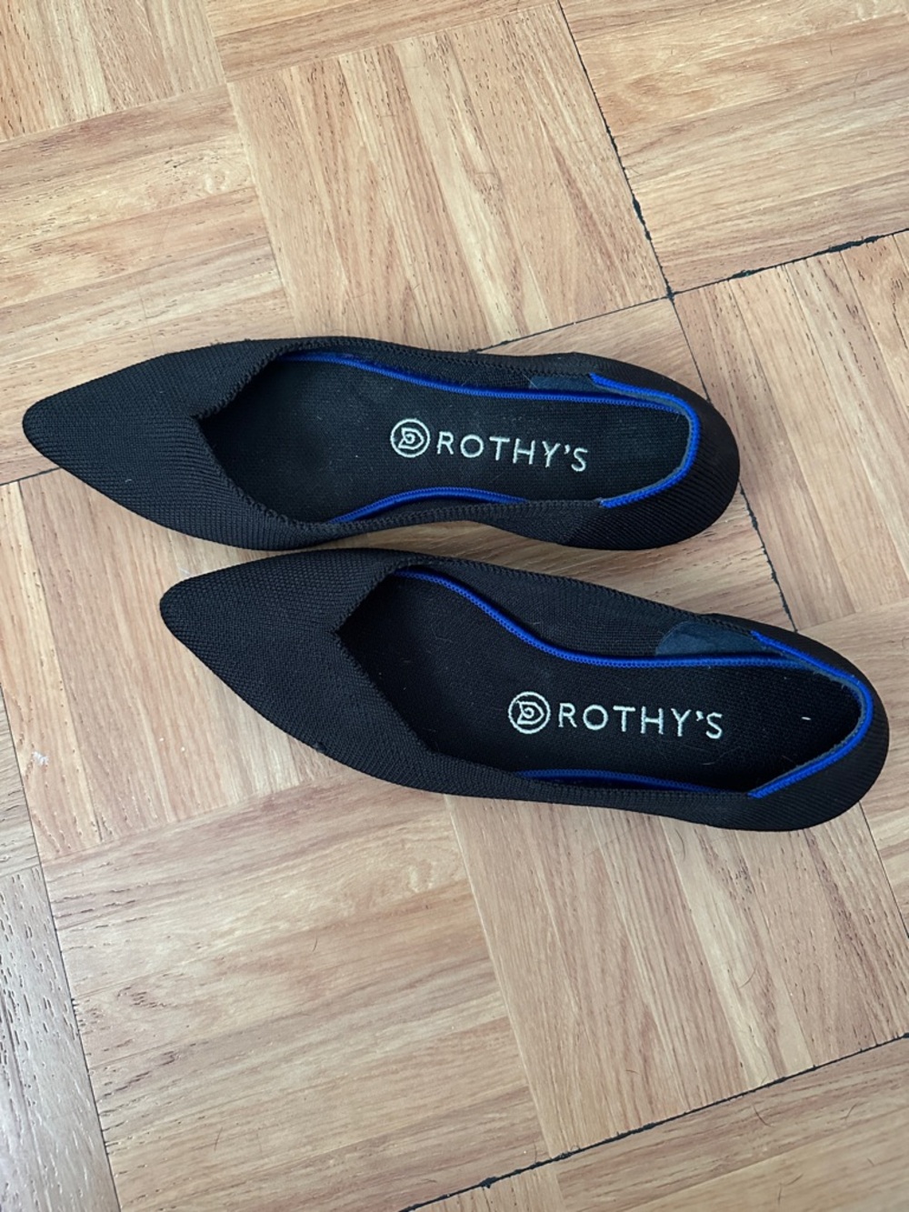 Rothy's Black Pointed Toe Flats with Blue Trim